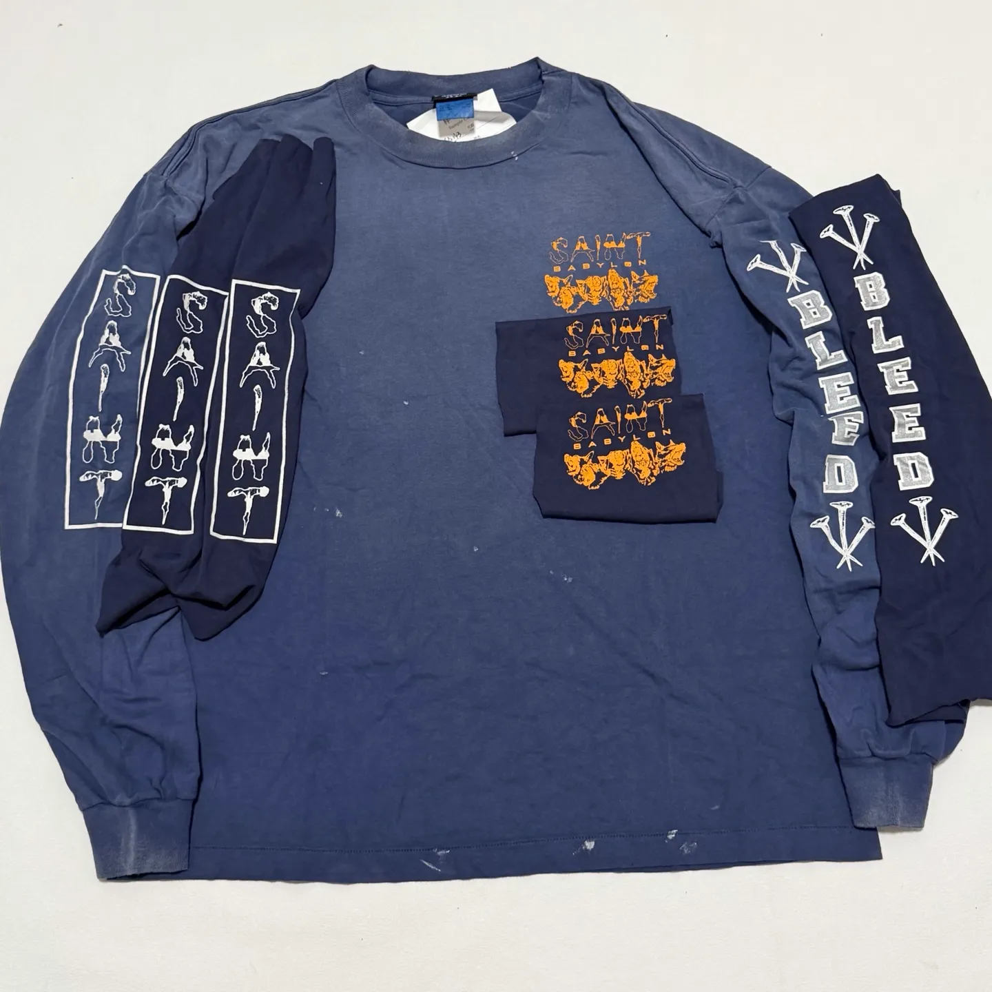 SAINT Mxxxxxx × BABYLON BBLN_LS TEE/SAINT BABYLON/NVY/BABYLON co-branded style Wolf head SAINT/nail distressed long sleeves Washed blue S-XL Completely matched Tube weaving fabric without side seams Garment dyeing Maliu water faded distressing Simulated sun fading treatment Natural fading Handmade holes and frayed Ink splashing treatment Correct main mark/wash mark/little angel anti-counterfeiting mark